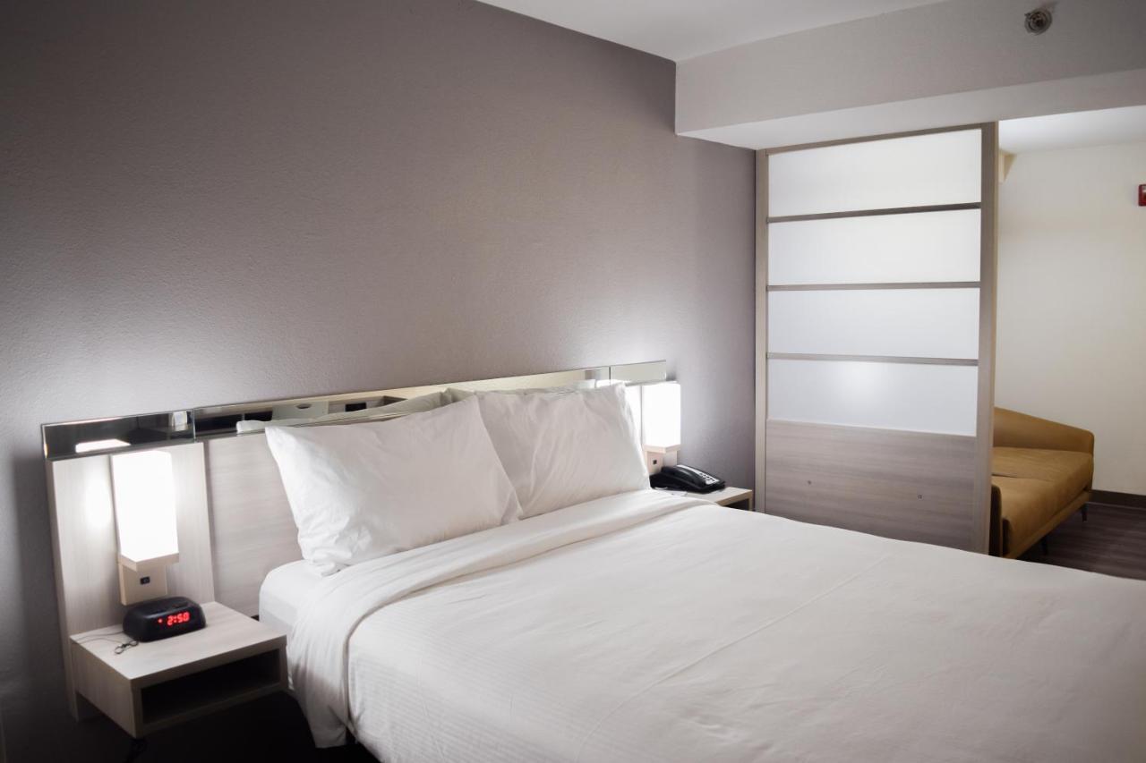Travelers Inn And Suites ראלי מראה חיצוני תמונה